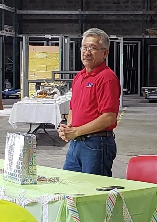 Hung, retiring Supervisor of the Mills & Nebraska Metal Fabrication Shop, at his retirement celebration
