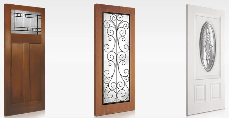 Three Plastpro fiberglass entry doors in wood grain, decorative glass, and smooth white finishes